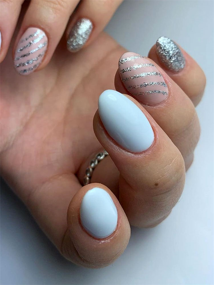 To give you some nail art inspiration, we have found 42 simple spring nail ideas. There is a mix of designs featured from flowers nails to french nails. So, take a look and find a beautiful pring nail design. #springnails #naildesigns #nails